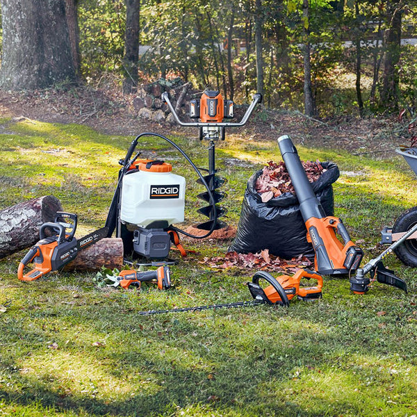 Family shot showing RIDGID outdoor power equipment